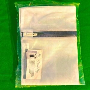 New! Free with purchase white mesh laundry bag with zipper close 🎁